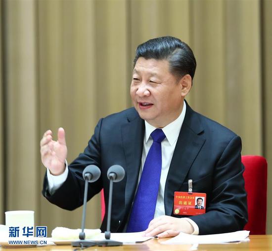 12月18日至20日，中央经济工作会议在北京举行。中共中央总书记、国家主席、中央军委主席习近平发表重要讲话。新华社记者 谢环驰 摄
